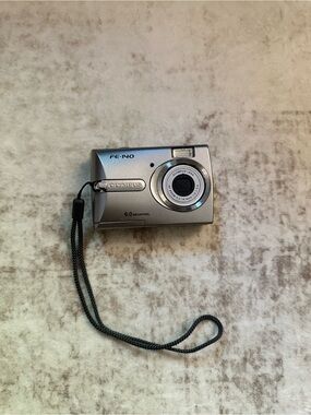 Olympus FE-140 6.0MP Digital Camera Silver Tested Working Loose Battery Lid
